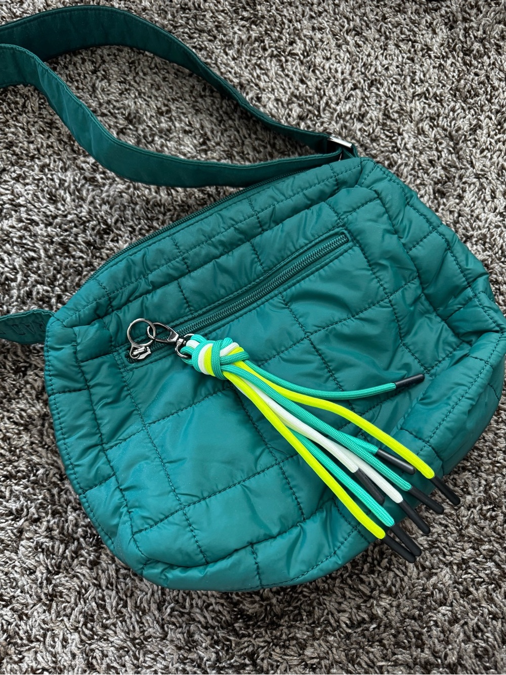 Quilted Teal Shoulder Bag with Neon Tassel Accent